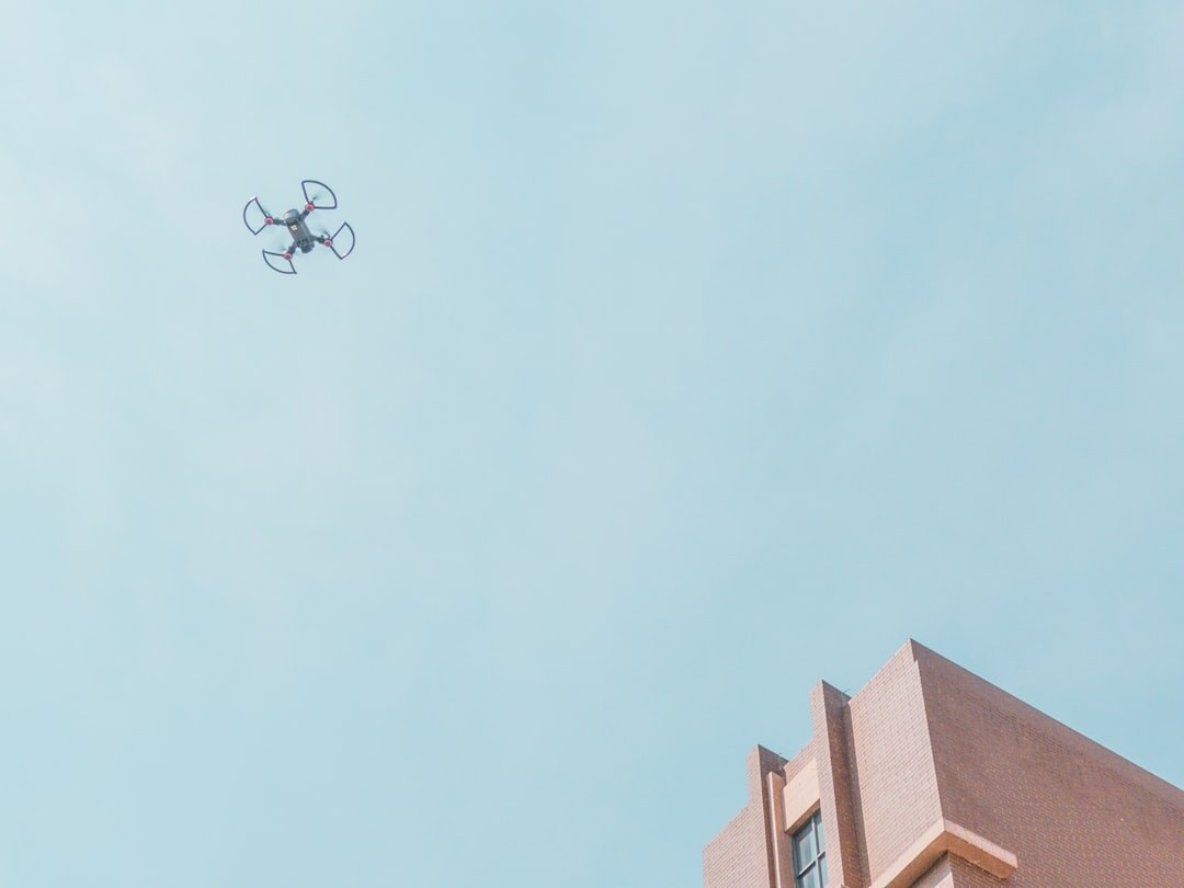 Drone hovering in the sky used for aerial event coverage