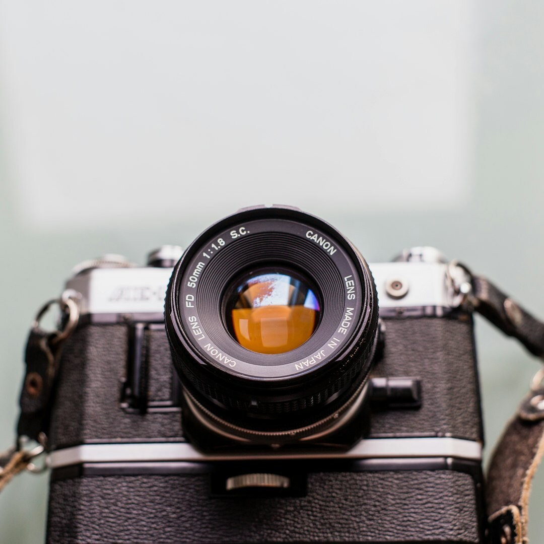 Close-up of a camera lens with visible glass elements