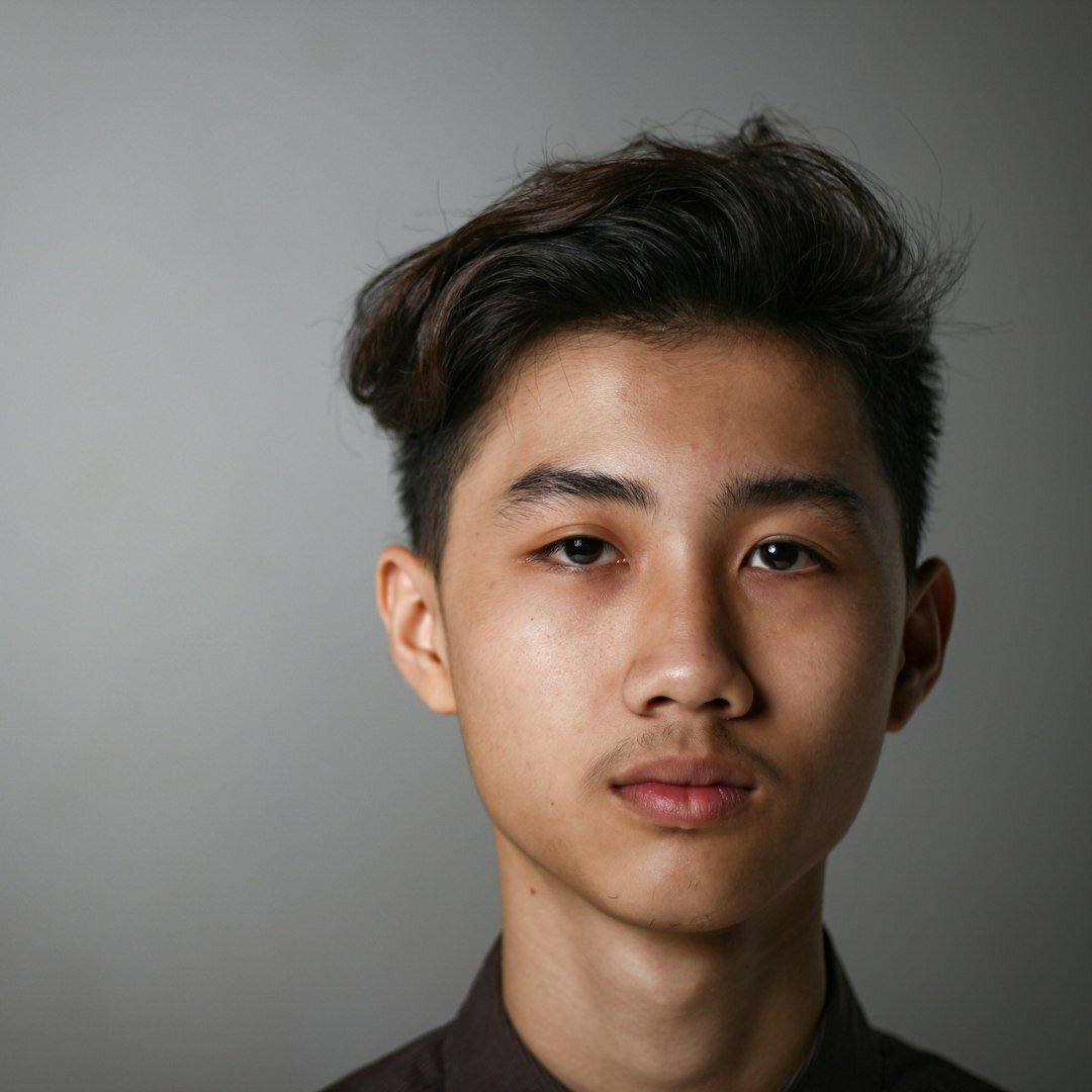 Studio portrait of a man in business casual attire